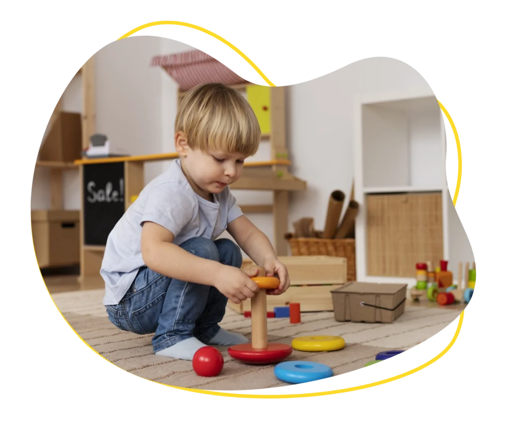 boy playing with toys img